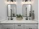 Double vanity bathroom with modern fixtures at 3024 Sadler Woods Ln, Charlotte, NC 28214