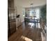 Bright dining room with hardwood floors and large windows at 3636 Kimber Ln, Sherrills Ford, NC 28673