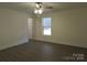 Spacious bedroom with ceiling fan and large window at 3720 Turner Rd, Clover, SC 29710