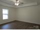 Spacious bedroom with hardwood floors and a window at 3720 Turner Rd, Clover, SC 29710