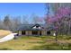 The exterior of the home featuring black trim, a covered porch and fresh landscaping at 3720 Turner Rd, Clover, SC 29710