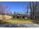 Charming exterior of a home with black trim, a covered porch and fresh landscaping at 3720 Turner Rd, Clover, SC 29710