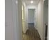 Bright hallway with hardwood floors and access to bedrooms at 3720 Turner Rd, Clover, SC 29710