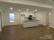 Modern kitchen with granite countertops and island at 3720 Turner Rd, Clover, SC 29710