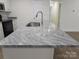 Kitchen island with granite countertop and sink at 3720 Turner Rd, Clover, SC 29710