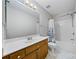 Clean bathroom with shower/tub combo, vanity, and updated fixtures at 6078 Bobcat Pl, Charlotte, NC 28269