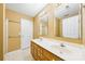 Double vanity bathroom with updated wood cabinets at 6078 Bobcat Pl, Charlotte, NC 28269