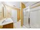 Bathroom with a double vanity and a separate shower at 6078 Bobcat Pl, Charlotte, NC 28269