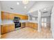 Kitchen with stainless steel appliances and wood cabinets at 6078 Bobcat Pl, Charlotte, NC 28269