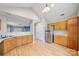 Kitchen with light oak cabinets and stainless steel appliances at 6078 Bobcat Pl, Charlotte, NC 28269