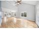 Spacious living room with vaulted ceiling and hardwood floors at 6078 Bobcat Pl, Charlotte, NC 28269