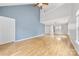 Bright living room featuring hardwood floors and vaulted ceilings at 6078 Bobcat Pl, Charlotte, NC 28269