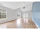 Living area with hardwood floors and access to patio at 6078 Bobcat Pl, Charlotte, NC 28269