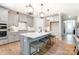 Modern kitchen with gray cabinets and large island at 9835 Quercus Ln, Huntersville, NC 28078