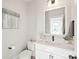 Clean and modern powder room with white vanity and quartz countertop at 1066 Riverwalk Pkwy, Rock Hill, SC 29730