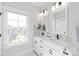 Modern bathroom with double vanity and marble countertops at 1066 Riverwalk Pkwy, Rock Hill, SC 29730