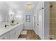 Elegant bathroom with double vanity and modern fixtures at 111 Breezeview Pl, Mooresville, NC 28117