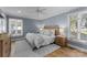 Bright bedroom featuring a comfortable bed and ample natural light at 111 Breezeview Pl, Mooresville, NC 28117