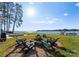 Lakefront property with firepit and seating at 111 Breezeview Pl, Mooresville, NC 28117