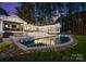 Stunning pool and spa at sunset at 111 Breezeview Pl, Mooresville, NC 28117