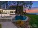 Luxury pool and spa with sunset view at 111 Breezeview Pl, Mooresville, NC 28117