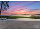 Stunning lake view from the backyard pool area at 111 Breezeview Pl, Mooresville, NC 28117