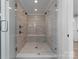 Large walk-in shower with double shower heads and built-in seat at 111 Breezeview Pl, Mooresville, NC 28117