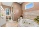 Elegant bathroom with soaking tub, shower, and double vanity at 111 Rapids Run Trl # 17, Iron Station, NC 28080