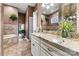 Bathroom features granite countertop, double sinks, and white cabinets at 111 Rapids Run Trl # 17, Iron Station, NC 28080