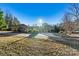 Brick home with a large driveway and mature trees at 111 Rapids Run Trl # 17, Iron Station, NC 28080