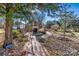 Brick paved pathway leads to a stone fireplace at 111 Rapids Run Trl # 17, Iron Station, NC 28080