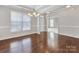 Spacious dining room with hardwood floors and chandelier at 1265 Reflection Nw Ave, Concord, NC 28027