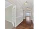 Hardwood floor entryway with views into adjacent rooms at 1265 Reflection Nw Ave, Concord, NC 28027