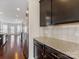 Kitchen features granite countertops and dark wood cabinets at 1265 Reflection Nw Ave, Concord, NC 28027