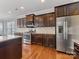 Modern kitchen with stainless steel appliances and granite countertops at 1265 Reflection Nw Ave, Concord, NC 28027