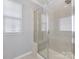 Large walk-in shower with glass enclosure and built-in seat at 1265 Reflection Nw Ave, Concord, NC 28027