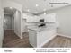 Modern kitchen with island, white cabinets, granite countertops at 13119 Hamilton Rd, Charlotte, NC 28273