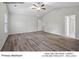 Vaulted ceilings and ceiling fan/light included in primary bedroom at 13119 Hamilton Rd, Charlotte, NC 28273