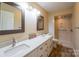 Updated bathroom with double vanity and walk-in shower at 1544 Daybreak Ridge Rd, Kannapolis, NC 28081