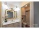 Bathroom with vanity, mirror, and toilet at 1544 Daybreak Ridge Rd, Kannapolis, NC 28081