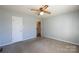 Bedroom with ceiling fan and access to bathroom at 1544 Daybreak Ridge Rd, Kannapolis, NC 28081