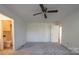 Bedroom with grey carpet and ceiling fan at 1544 Daybreak Ridge Rd, Kannapolis, NC 28081