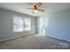 Spacious bedroom with neutral walls and carpet at 1544 Daybreak Ridge Rd, Kannapolis, NC 28081