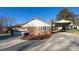 Carport and side view of brick ranch house at 1544 Daybreak Ridge Rd, Kannapolis, NC 28081