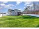 Large backyard with grassy area and white fence at 159 Charles Farm Dr, Cleveland, NC 27013