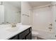 Clean bathroom with tub, toilet, and dark vanity at 159 Charles Farm Dr, Cleveland, NC 27013