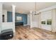 Bright and airy entryway with hardwood floors and elegant chandelier at 159 Charles Farm Dr, Cleveland, NC 27013