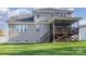 Two story house with gray siding and screened porch at 159 Charles Farm Dr, Cleveland, NC 27013