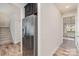 Stainless steel refrigerator in kitchen with hardwood floors at 159 Charles Farm Dr, Cleveland, NC 27013