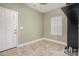 Laundry room with light green walls and tile floor at 159 Charles Farm Dr, Cleveland, NC 27013